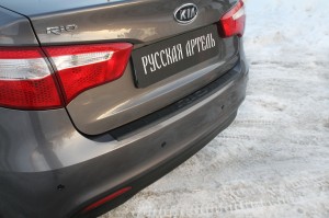 Kia Rio 11- накладка заднего бампера декоративная пластик защитная NKR025602 RUSSKAYA ARTEL